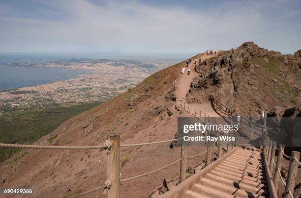 vesuvius crater walk looking down on naples. - mt vesuvius stock pictures, royalty-free photos & images