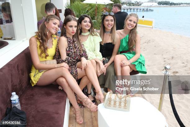 Paulina Swarovski and Victoria Swarovski attend Magnum photocall during the 70th annual Cannes Film Festival at Magnum Beach on May 18, 2017 in...