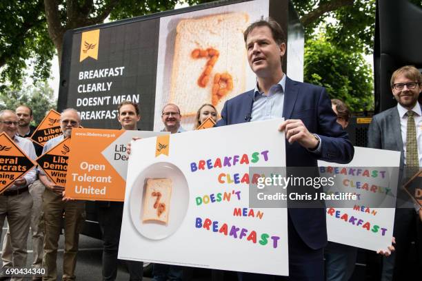 Liberal Democrats Party politician Nick Clegg speaks to the media and supporters whilst unveiling a poster attacking British Prime Minister Theresa...