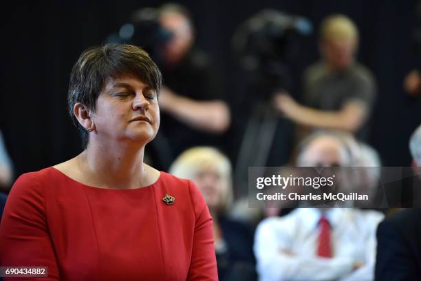 Leader and former First Minister Arlene Foster pauses before addressing the gathered media as the Democratic Unionist party launch their manifesto at...