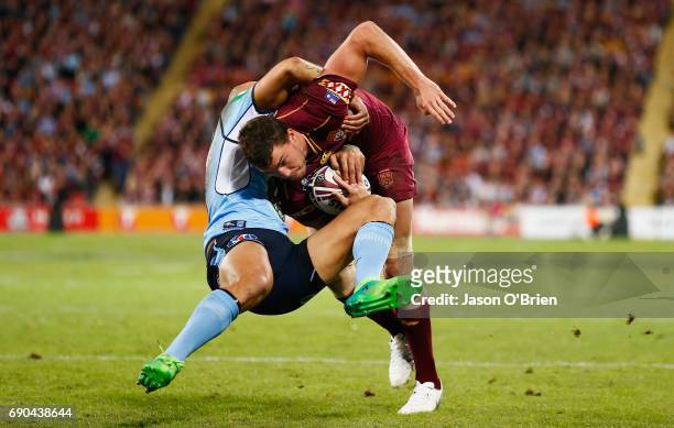 Corey Oates of the Maroons in action during game one of the State Of Origin series between the Queensland Maroons and the New South Wales Blues at...