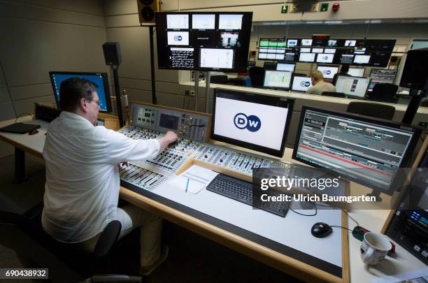 The Deutsche Welle - Radio and TV broadcasts from Germany into the world. The photo shows a TV studio with cutting room .