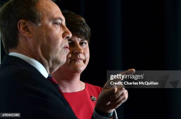 Leader and former First Minister Arlene Foster watches DUP deputy leader Nigel Dodds addressing the gathered media as the Democratic Unionist party...