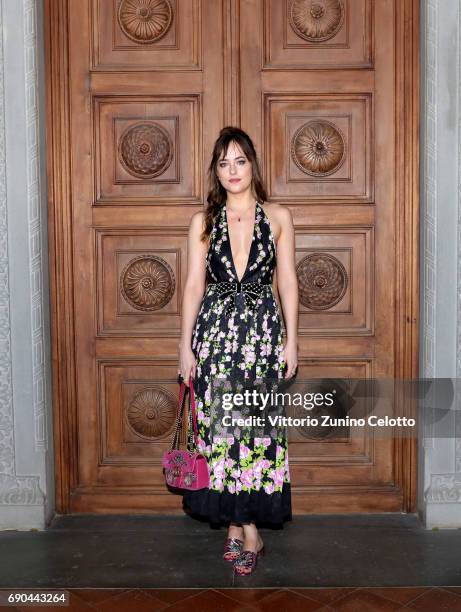 Dakota Johnson arrives at the Gucci Cruise 2018 fashion show at Palazzo Pitti on May 29, 2017 in Florence, Italy.