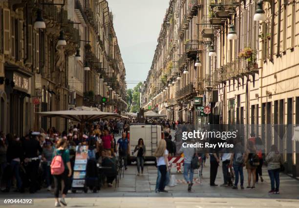 turin street with tourists and shoppers. - turin stock pictures, royalty-free photos & images