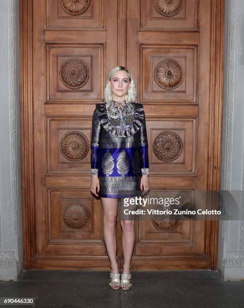 Saoirse Ronan arrives at the Gucci Cruise 2018 fashion show at Palazzo Pitti on May 29, 2017 in Florence, Italy.