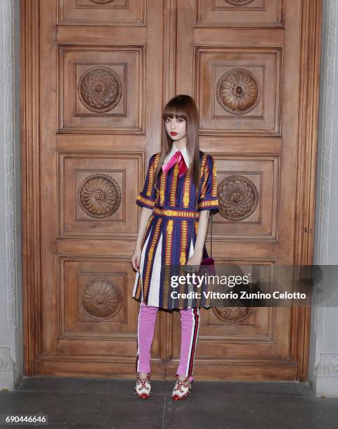 Risa Nakamura arrives at the Gucci Cruise 2018 fashion show at Palazzo Pitti on May 29, 2017 in Florence, Italy.