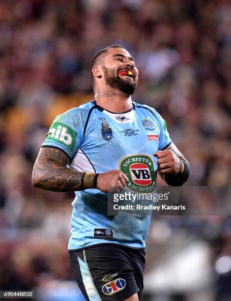 Andrew Fifita of the Blues smiles at the crowd after scoring a try during game one of the State Of Origin series between the Queensland Maroons and...