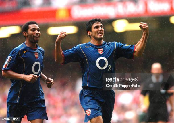Jose Reyes and Jermaine Pennant of Arsenal celebrates after putting Arsenal 2-1 ahead during the FA Community Shield match between Arsenal and...