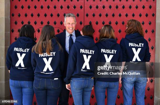 Westminster candidate Ian Paisley Junior winks at a party member as he is pictured with some of his election canvassers as the Democratic Unionist...