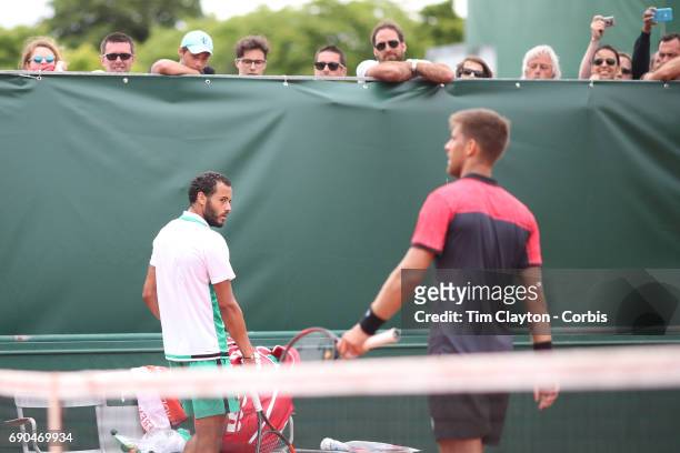 French Open Tennis Tournament - Day Three. Laurent Lokoli of France refuses to shake hands with winner Martin Klizan of Slovakia during a tension...