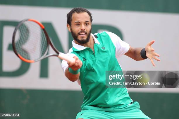 French Open Tennis Tournament - Day Three. Laurent Lokoli of France in action during his loss to Martin Klizan of Slovakia during a tension filled...