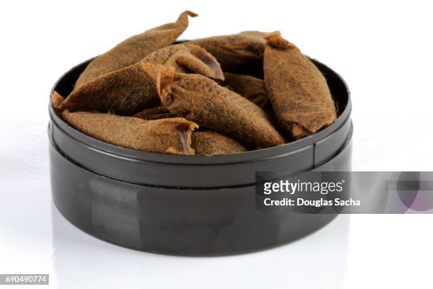 container of chewing tobacco - pouch stock pictures, royalty-free photos & images