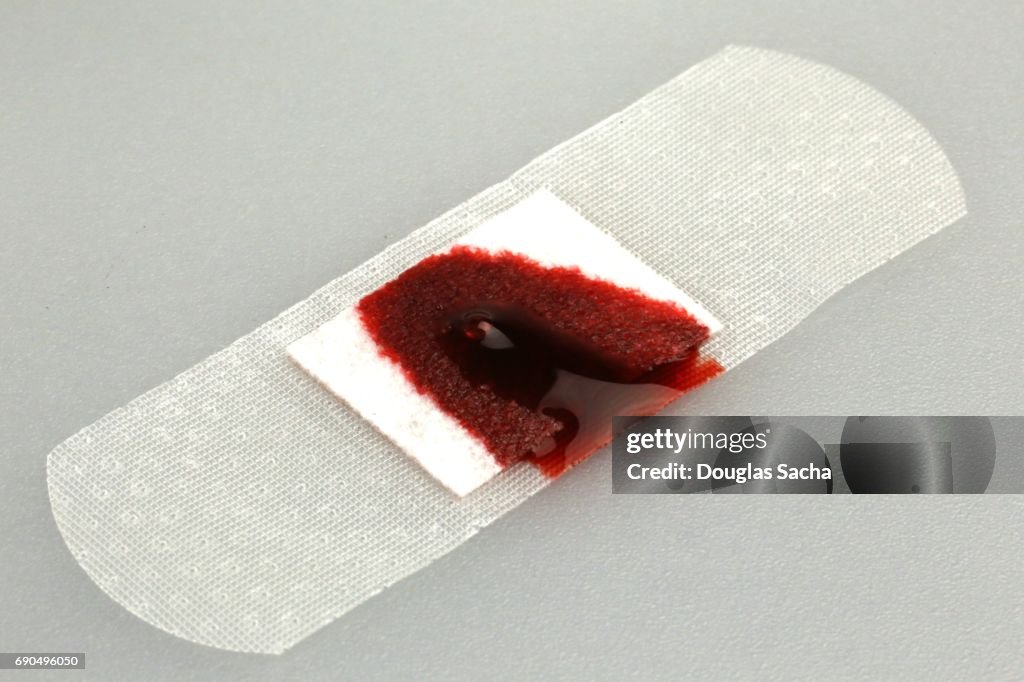 Adhesive Bandage with blood spot