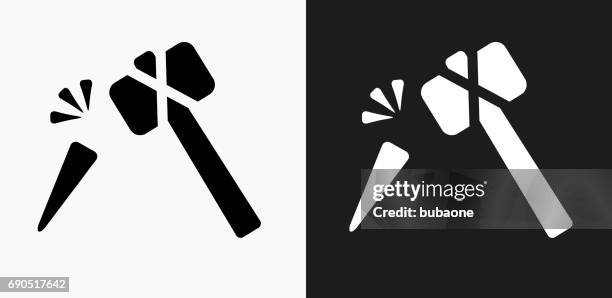 hammer and chisel icon on black and white vector backgrounds - chisel stock illustrations
