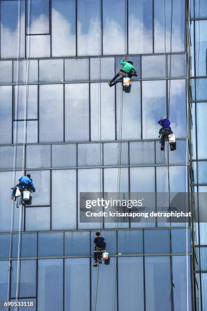 building cleaning - glass installer stock pictures, royalty-free photos & images
