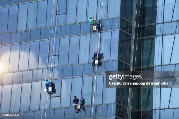 building cleaning - glass installer stock pictures, royalty-free photos & images