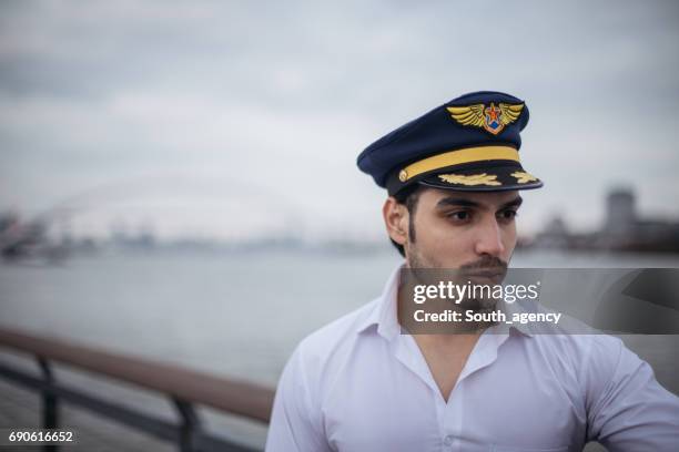 attractive and handsome captain - beard pilot stock pictures, royalty-free photos & images