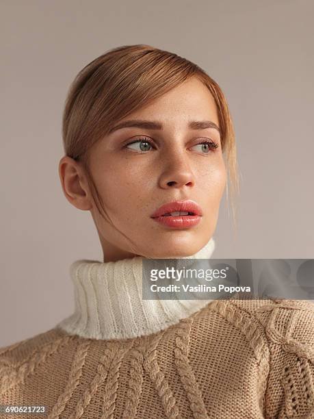 young beautiful woman in knitwear - fashion model stock-fotos und bilder