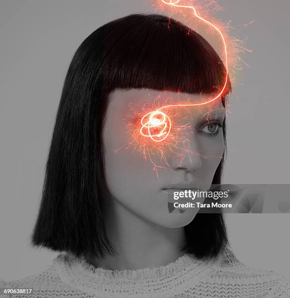 portrait of woman with sparkles on face - female streaking stockfoto's en -beelden