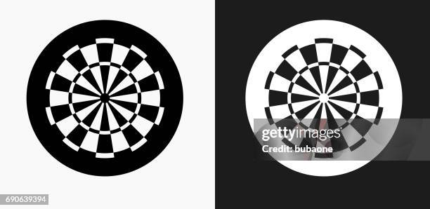 dartboard icon on black and white vector backgrounds - throwing darts stock illustrations