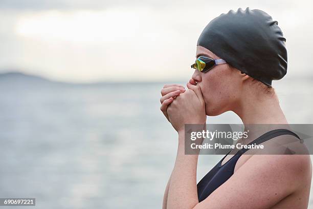 winter swim - swimming cap stock pictures, royalty-free photos & images