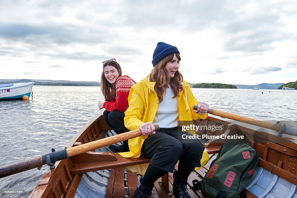 Two friends in a row boat