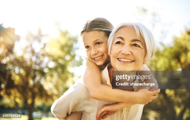 granddaughters make life a joy - granddaughter stock pictures, royalty-free photos & images