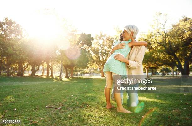 grandmother's give the best hugs - grandmother granddaughter stock pictures, royalty-free photos & images