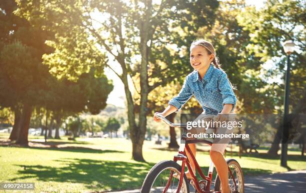 it gets more fun with every pedal - girl bike stock pictures, royalty-free photos & images