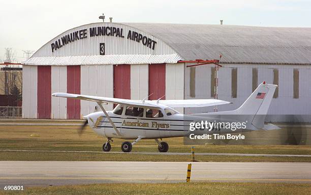 An American Flyers Pilot Training School instructor and student taxi in their Cessna 172 single-engine plane January 7, 2002 at Palwaukee Municipal...