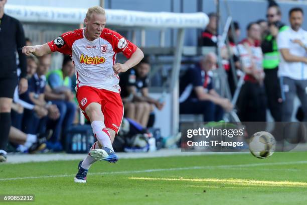 Uwe Hesse of Jahn Regensburg controls the ball during the Second Bundesliga Playoff first leg match between Jahn Regensburg and TSV 1860 Muenchen at...