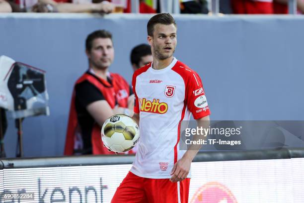 Benedikt Saller of Jahn Regensburg looks on during the Second Bundesliga Playoff first leg match between Jahn Regensburg and TSV 1860 Muenchen at...