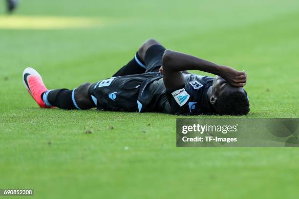 Romuald Lacazette of 1860 Munich on the ground during the Second Bundesliga Playoff first leg match between Jahn Regensburg and TSV 1860 Muenchen at...