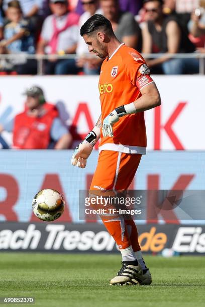 Goalkeeper Philipp Pentke of Jahn Regensburg controls the ball during the Second Bundesliga Playoff first leg match between Jahn Regensburg and TSV...