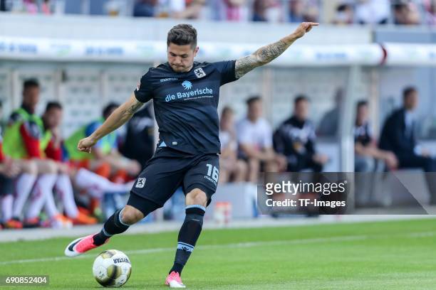 Marnon Busch of 1860 Munich controls the ball during the Second Bundesliga Playoff first leg match between Jahn Regensburg and TSV 1860 Muenchen at...
