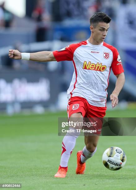 Erik Thommy of Jahn Regensburg controls the ball during the Second Bundesliga Playoff first leg match between Jahn Regensburg and TSV 1860 Muenchen...