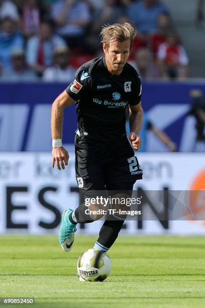 Stefan Aigner of 1860 Munich controls the ball during the Second Bundesliga Playoff first leg match between Jahn Regensburg and TSV 1860 Muenchen at...