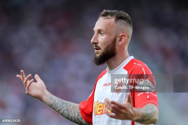 Marvin Knoll of Jahn Regensburg looks on during the Second Bundesliga Playoff first leg match between Jahn Regensburg and TSV 1860 Muenchen at...