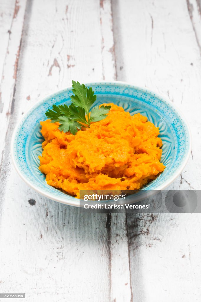 Bowl of mashed sweet potato