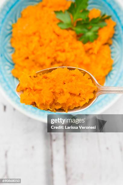 bowl of mashed sweet potato - mashed sweet potato stock pictures, royalty-free photos & images