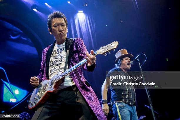 Hotei joins Zucchero on stage at the Royal Albert Hall on 21 October 2016 in London, United Kingdom.