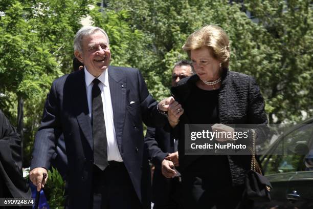 Former King of Greece Constantine II and Queen Anne-Marie, arrive for the memorial service of Constantine Mitsotakis, at the Athens cathedral on May...