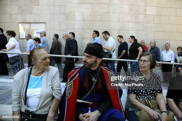 Mourners gather at the Athens cathedral on May 31 to pay respect to Constantine Mitsotakis, The former conservative prime minister died this week...