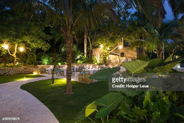 sugarmill restaurant of half moon resort at dusk - montego bay stock pictures, royalty-free photos & images