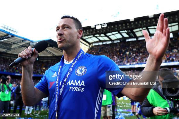 John Terry of Chelsea addresses Roman Abramovich from the pitch following the Premier League match between Chelsea and Sunderland at Stamford Bridge...