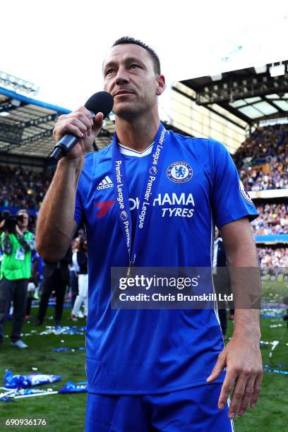 John Terry of Chelsea addresses Roman Abramovich from the pitch following the Premier League match between Chelsea and Sunderland at Stamford Bridge...