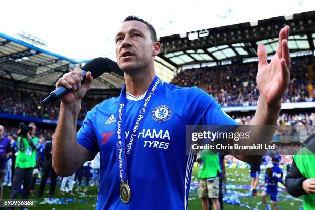 John Terry of Chelsea addresses Roman Abramovich from the pitch following the Premier League match between Chelsea and Sunderland at Stamford Bridge...