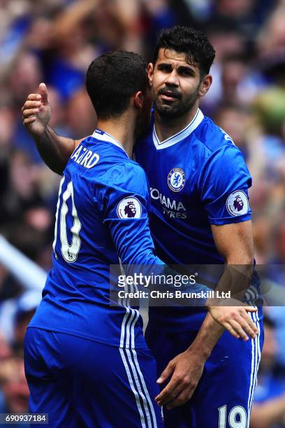 Eden Hazard of Chelsea is congratulated by team-mate Diego Costa after scoring his side's second goal during the Premier League match between Chelsea...