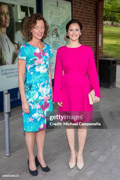 Princess Sofia of Sweden is greeted by Johanna Adami, director of the Sophiahemmet college while attending a merit ceremony at Sophiahemmet College...